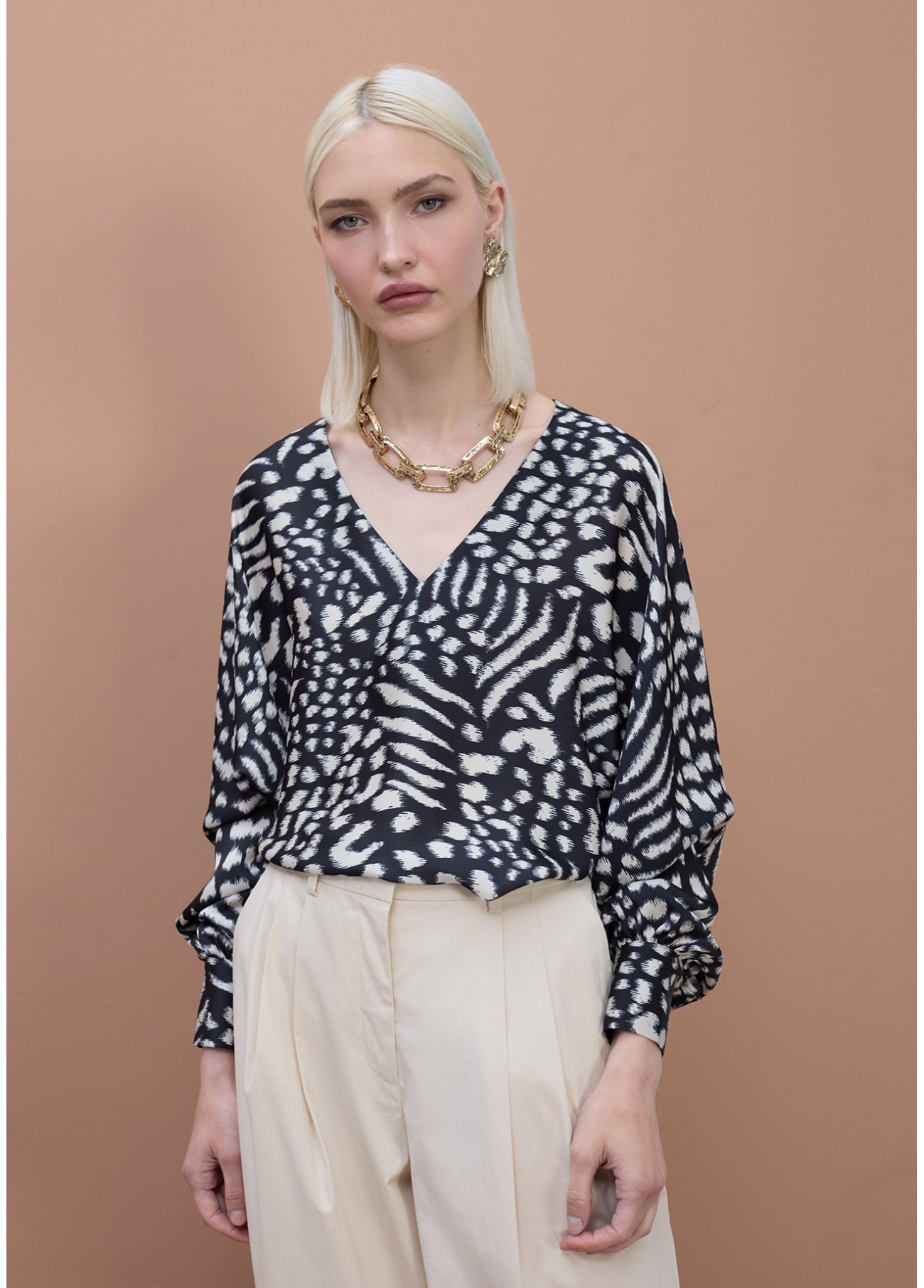 v-neck-blouse-with-puff-sleeves Elegant Blouse - Ecru-Black - Image 1